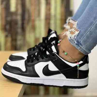 Nike Dunk Low Retro, Blanc Noir Panda WWDS00010 Mode 10 000 FCFA